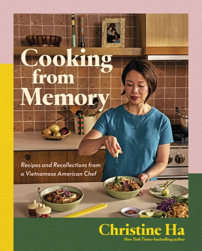 The cover of Cooking from Memory: Christine at her kitchen counter with bowls of noodle soup.